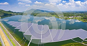 Aerial view of Floating solar panels or solar cell Platform system on the lake