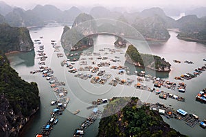 Aerial view of floating villages around Cat Ba islands. Cat Ba is the largest of the 366 islands, which make up the southeastern