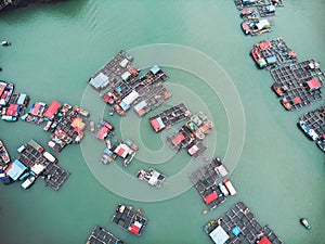 Aerial view of floating villages around Cat Ba islands. Cat Ba is the largest of the 366 islands, which make up the southeastern