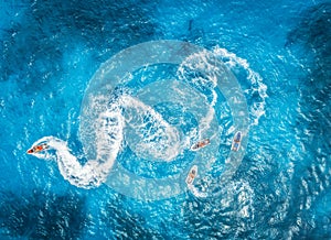 Aerial view of floating water scooter in blue water