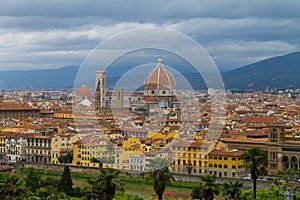 Aerial view of Florence Italy, beautiful old city full of historical amazing buildings, cathedrals and bridges.