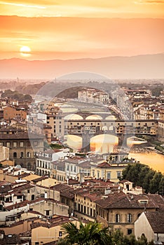 Aerial view of Florence at sunset with the Ponte Vecchio and the Arno river, Tuscany Italy