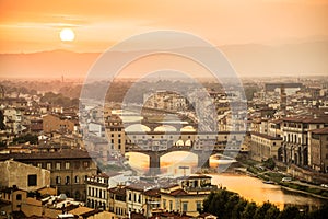 Aerial view of Florence at sunset with the Ponte Vecchio and the Arno river, Tuscany Italy