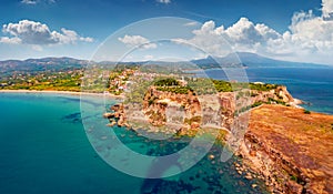 Aerial view from flying drone of east coast of Ionina sea. Colorful summer scene of Koroni town, Messenia, Peloponnese, Greece