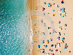 Aerial View From Flying Drone Of People Crowd Relaxing On Beach
