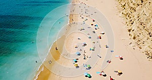 Aerial View From Flying Drone Of People Crowd Relaxing On Beach