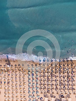 Aerial View From Flying Drone Of People Crowd Relaxing On Beach In Bulgaria