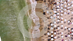 Aerial View From Flying Drone Of People Crowd Relaxing On Beach In Bulgaria