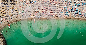 Aerial View From Flying Drone Of People Crowd Relaxing On Beach In Romania