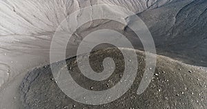 Aerial view flying low within Hverfjall crater