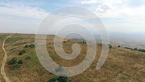 Aerial view. Flying over the beautiful mountain and beautiful forest. Aerial camera shot. Stavropol, mountain