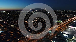 Aerial View Flying Through South Philadelphia Towards Center City at Night