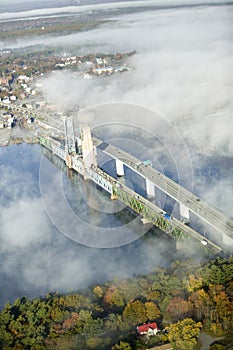Aerial view of fog over Bath Iron Works and Kennebec River in Maine. Bath Iron Works is a leader in surface combatant design and photo