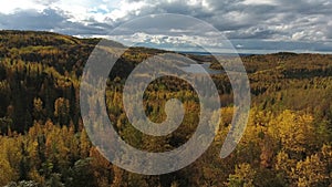 Aerial view of forest and lake on Kenai Peninsula in Alaska on autumn day.