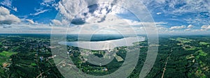 Aerial view of forest at sunrise. Drone shot flying over treetops, autumn forestn,