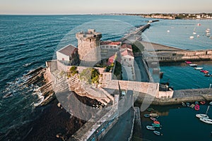 Aerial view of Fort de Socoa at sunset, with unique flysch landform in Ciboure and Saint-Jean-de-Luz, France photo
