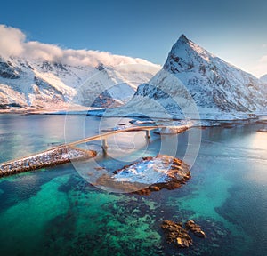 Aerial view of Fredvang bridges at sunset in winter