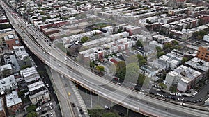 Aerial view of a freeway cutting through Brooklyn