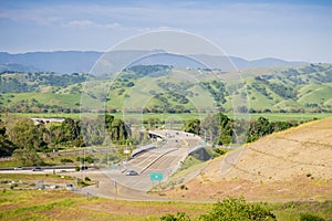 Aerial view of freeway entry, mountain background, south San Francisco bay, San Jose, California