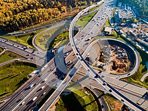 Aerial view of a freeway intersection traffic trails in Moscow.