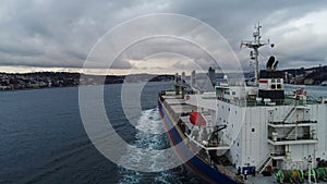 Aerial view of freight ship with cargo containers.