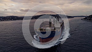 Aerial view of freight ship with cargo containers.