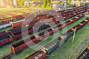 Aerial view of freight trains. Top view of old rusty wagons