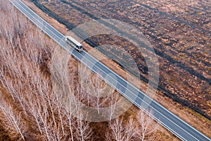 Aerial view of freight transport truck on the road