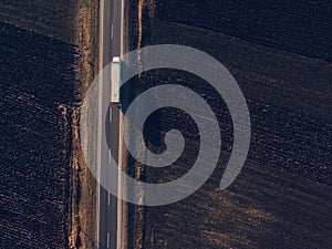 Aerial view of freight transportation truck on the road