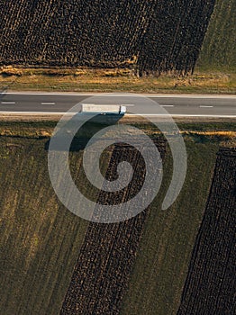 Aerial view of freight transportation truck on the road