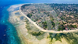 Aerial view of the fringing coral reef surrounding the small island of Gili Air in Lombok, Indonesia