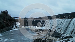 Aerial view of the frozen dam on the river in Taylors Falls, Minnesota