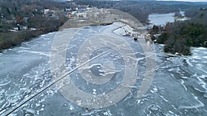 Aerial view of the frozen dam on the river in Taylors Falls, Minnesota