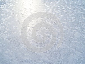 Aerial view of a frozen lake surface. Aerial Snow pattern on the frozen lake. Frozen lake ice captured with a drone. Aerial photo