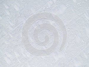 Aerial view of a frozen lake surface. Aerial Snow pattern on the frozen lake. Frozen lake ice captured with a drone. Aerial photo