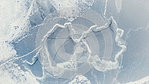 Aerial view of frozen lake. Winter background concept.