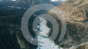 Aerial view of frozen river and lake near Suppiane and Venas di Cadore towns in northern mountains of Italy photo