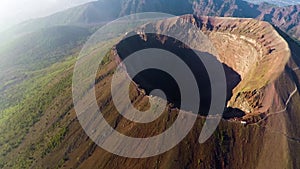 Aerial view, Full crater of the volcano Vesuvius, Italy, Naples, Epic volcano footage from height