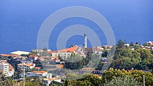 Aerial view of Funchal city along the Atlantic ocean in Madeira island photo