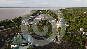 Aerial view of 4g and 5g cellular telecommunication towers at rural area