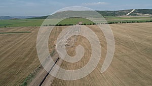 Aerial view of gas and oil pipeline construction and archaeological excavation. Big pipeline is under construction.