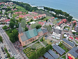 Aerial view on gathering of faithful people during devotion in church