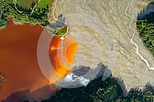 Aerial view of Geamana village toxic waste lake from coper mine