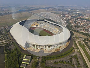 Aerial view of Gelora Bandung Lautan Api (GBLA) Stadium, the biggest football stadium in West Java, Indonesia,