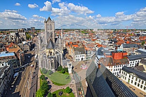 Aerial view of Ghent from Belfry. Saint Nicholas` Church and beautiful medieval buildings. Spring landscape photo.