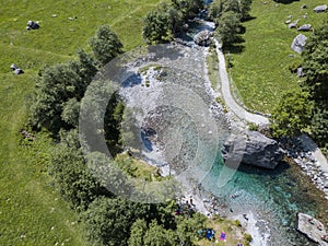 Aerial view of the giant rock called the Bidet della Contessa in the Val di Mello, a green valley. Sondrio. Italy