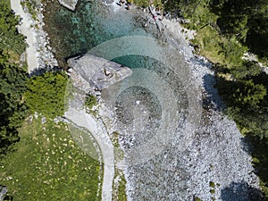 Aerial view of the giant rock called the Bidet della Contessa in the Val di Mello, a green valley. Sondrio. Italy