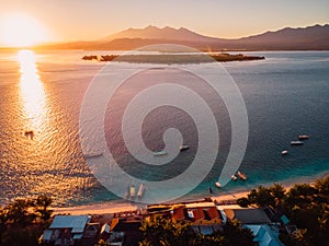 Aerial view with Gili islands, ocean and sunrise