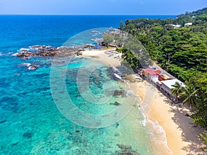 Aerial view of Glacis Beach shoreline on a sunny day