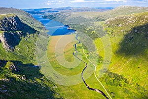 Aerial view of the Glenveagh National Park with castle Castle and Loch in the background - County Donegal, Ireland